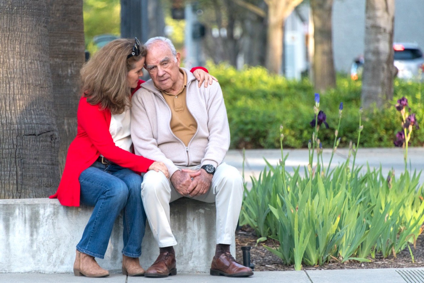 An elderly couple sitting together
