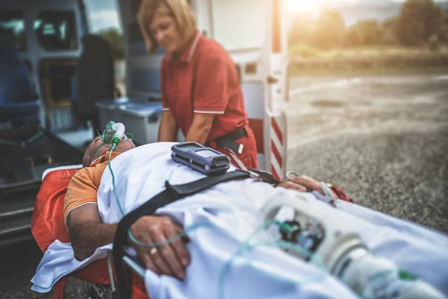 Paramedics attending an injured pedestrian